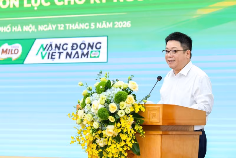 Que Dinh Nguyen, Deputy Editor-in-Chief and Deputy Secretary of the Party Committee of Nhan Dan Newspaper, delivers the opening speech at the conference.