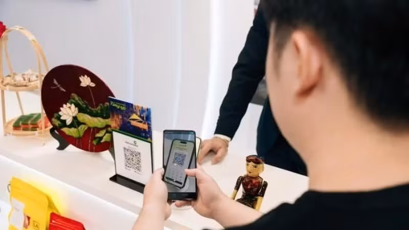 Users experience cross-border QR payments.