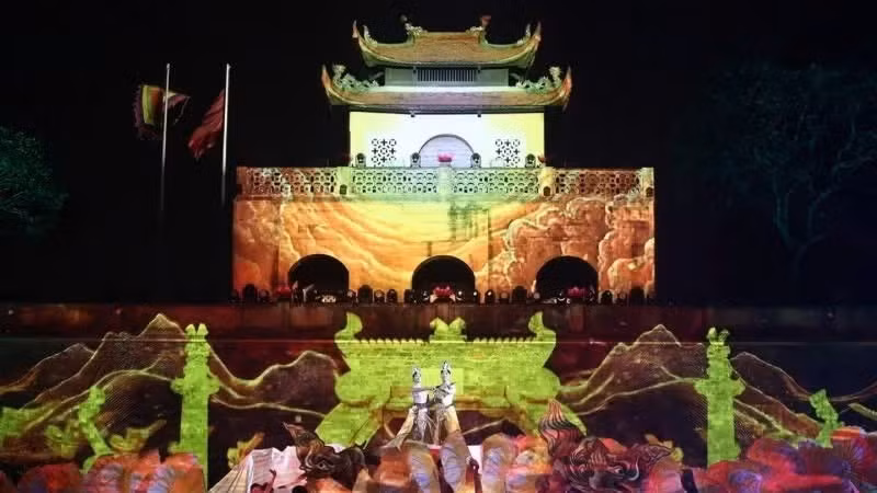 Modern projection technology transforms the Imperial Citadel of Thang Long into a vibrant stage filled with colour. (Photo: NAM NGUYEN)