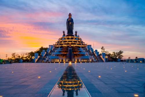 The Bodhisattva statue on the peak of Ba Den Mountain