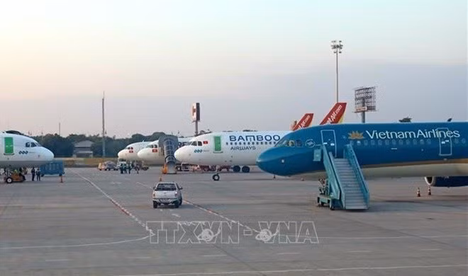 The resumption of Laos-Vietnam air route makes it easier for Vietnamese expats in Laos to return home (Photo: VNA)