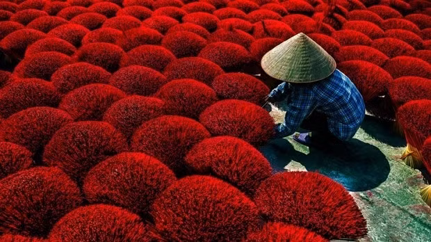 A photograph titled “Sunny Day” taken by Tran Viet Van is the winner in the Indigenous Cultures category at the CEFF International Environmental Photography.