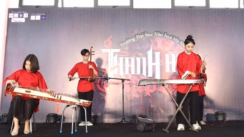 The Cam Ca Club performs with traditional musical instruments.