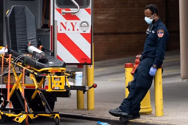 A healthcare worker takes a break outside Wyckoff Heights Medical Center during the outbreak of the coronavirus disease (COVID-19) in New York City, US, April 5, 2020. (Photo: Reuters)