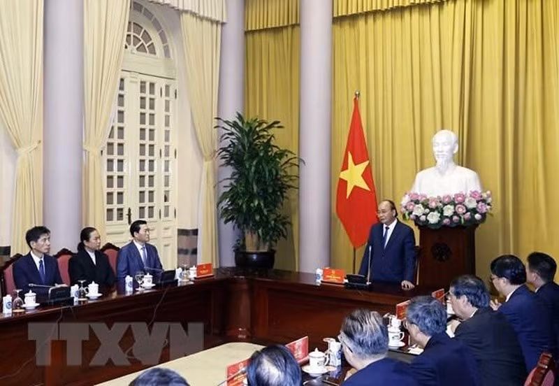 President Nguyen Xuan Phuc speaks at the reception. (Photo: VNA)