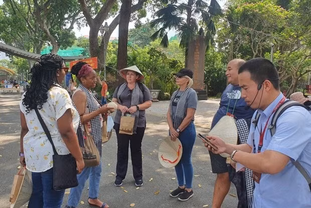 Tourists in Ho Chi Minh City (Photo: VNA)