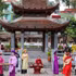 The Huong Sac Viet Art Troupe performs for the public at Van Lake within the Temple of Literature–Imperial Academy Special National Relic Site. (Photo: GIANG NAM)