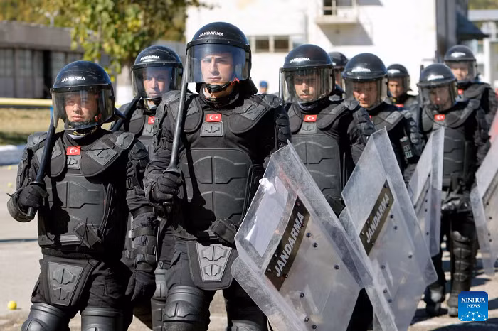 Turkish riot policemen participate in the "Carpathian Blue Shield 2026" international exercise at the Gendarmerie Training Center in Ochiuri village, north of Bucharest, Romania, Oct. 1, 2026. More than 500 riot policemen participated in the drill. (Photo: Xinhua)