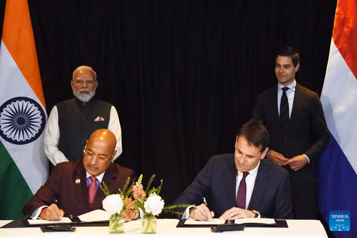 Dutch Prime Minister Rob Jetten (R, back) and visiting Indian Prime Minister Narendra Modi (L, back) oversee the signing of a Memorandum of Understanding by ASML President and CEO Christophe Fouquet (R, front), and Tata Electronics CEO and Managing Director Randhir Thakur (L, front) in The Hague, the Netherlands, on May 16, 2026. Modi is on a two-day visit to the Netherlands from May 16 to 17. (Xinhua)