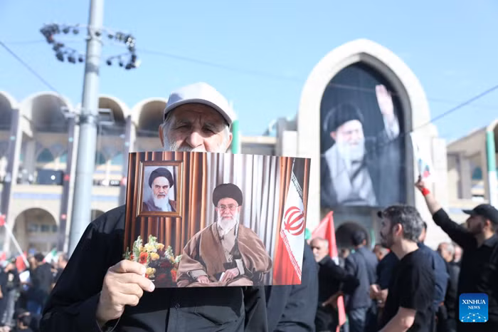 People attend a farewell ceremony for Iran's late Supreme Leader Ayatollah Ali Khamenei in Tehran, Iran, July 4, 2026. A two-day farewell ceremony for Iran's late Supreme Leader Ayatollah Ali Khamenei began here at Imam Khomeini's Mosalla prayer hall on Saturday morning, drawing huge crowds from across the country. (Xinhua)