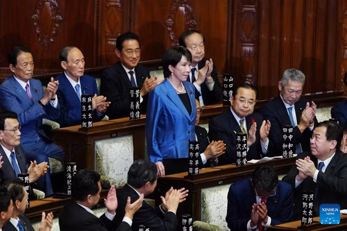 Takaichi Sanae (C) rises to accept a round of applause after winning the prime ministerial designation vote in the House of Representatives in Tokyo, Japan, Oct. 21, 2025. Takaichi Sanae, leader of Japan's ruling Liberal Democratic Party (LDP), was officially elected the country's prime minister on Tuesday after winning in both houses of parliament, becoming the country's first female leader. (Photo: Xinhua)
