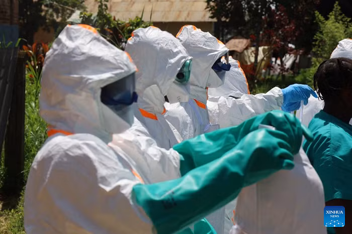Medical workers wear protective suits before disinfecting work in Mongbwalu, Ituri province, the Democratic Republic of the Congo, May 24, 2026. The Ebola outbreak in the Democratic Republic of the Congo (DR Congo) remains at an early stage, but infections and deaths continue to rise, Health Minister Roger Kamba said Tuesday. (Xinhua)