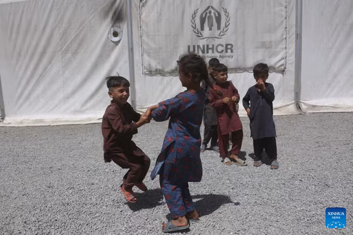 Afghan children have fun at a makeshift refugee camp in Kabul, Afghanistan, June 11, 2026. A total of 724 families, which made up of 3,693 individuals, ended their exile and returned to their homeland, Afghanistan, on Wednesday, reported the official Bakhtar News Agency on Thursday. More than 85,000 Afghan refugees have returned to their country from neighboring Pakistan and Iran over the past couple of weeks. (Photo: Xinhua)
