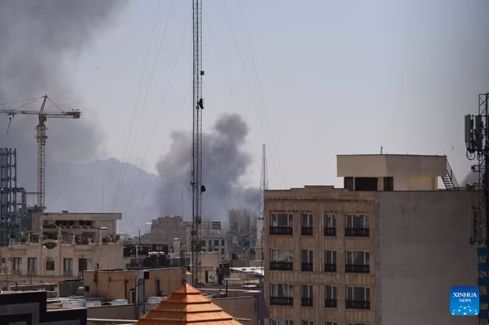 This photo taken on March 1, 2026 shows thick smoke in Tehran, Iran. Israel's military said Sunday its warplanes carried out "large-scale strikes" on the headquarters of Iran's Islamic Revolutionary Guard Corps in Tehran, and released footage showing several bombs dropped on two adjacent compounds, causing large explosions. (Photo: Xinhua)