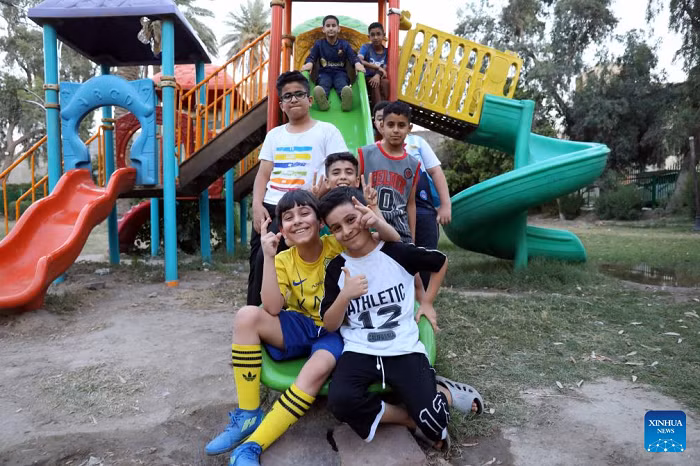  Boys play on a slide at a park in Baghdad, Iraq, on May 31, 2026. June 1 is International Children's Day. (Photo: Xinhua)