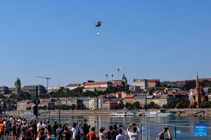 A Hungarian Air Force helicopter participates in a military air parade over the Danube in Budapest, Hungary, on Aug. 20, 2026. Hungary marks its national day on Thursday with traditional ceremonies, music concerts, and a redesigned evening spectacle in Budapest. (Photo: Xinhua)
