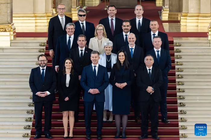 Hungarian Prime Minister Peter Magyar (3rd L, front) poses for a photo with members of Hungary's new government in Budapest, Hungary, May 12, 2026. Hungary's new government led by Prime Minister Peter Magyar took the oath of office in parliament here on Tuesday. (Photo: Xinhua)