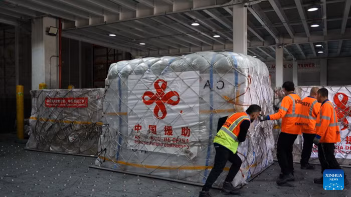 Staff members transfer humanitarian earthquake relief supplies provided by the Chinese government at an airport in Bogota, Colombia, Aug. 18, 2026. Humanitarian earthquake relief supplies provided by the Chinese government arrived in Bogota on Tuesday to support Colombia's disaster response and post-disaster reconstruction efforts. (Xinhua)