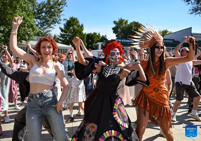 People dance during a festival of Latin American and Caribbean culture at Hermitage Garden in Moscow, Russia, July 18, 2026. Featuring live music, performance and traditional cuisines, the festival kicked off here on Saturday and will run until July 26. (Xinhua)