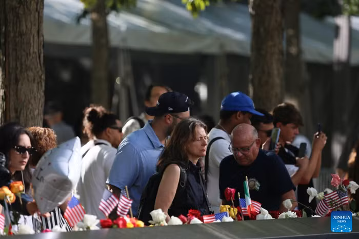 People mourn for the victims at the National September 11 Memorial & Museum in New York, the United States, Sept. 11, 2026. New Yorkers on Friday commemorated the victims of the 9/11 attacks on the 25th anniversary of the tragedy. (Xinhua)