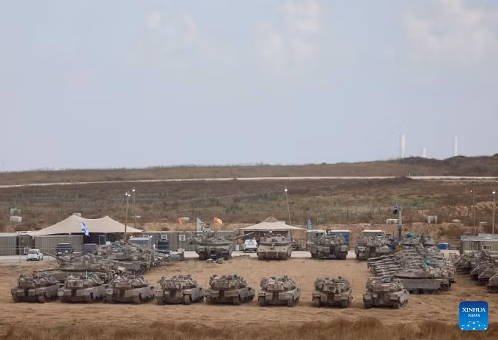  Israeli military vehicles are seen near Kibbutz Reim bordering Gaza in southern Israel, July 2, 2026. (Photo: Xinhua)