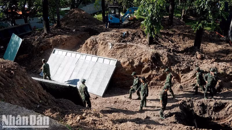 The Ho Chi Minh City High Command’s martyrs’ remains recovery team carries out its mission.