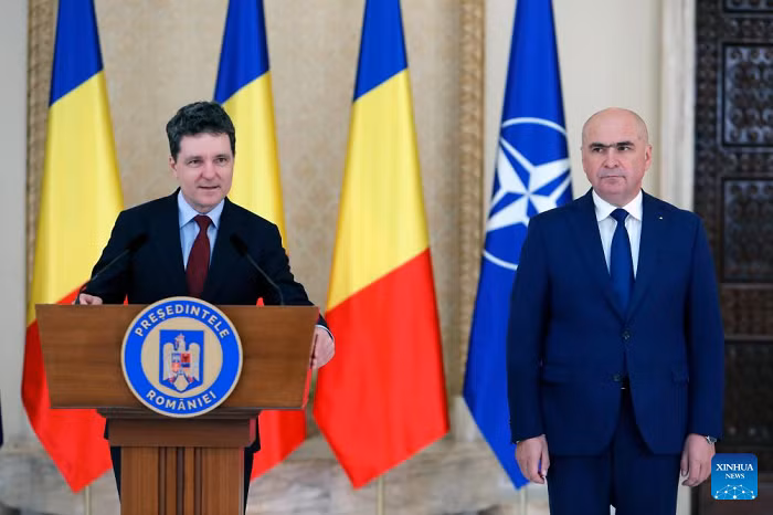 Romanian President Nicusor Dan (L) announces the nomination of Ilie Bolojan as Romania's Prime Minister at the Cotroceni Palace in Bucharest, Romania, June 20, 2025. Romanian President Nicusor Dan on Friday appointed Senate President Ilie Bolojan as the country's new prime minister, following weeks of coalition negotiations among major political parties. (Photo: Xinhua)
