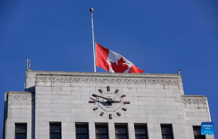 The Canadian national flag flies at half-mast over Vancouver City Hall in Vancouver, British Columbia, Canada, Feb. 11, 2026. Canadian Prime Minister Mark Carney on Wednesday ordered all flags on Parliament Hill and federal buildings across Canada to be flown at half-mast for seven days as the country mourns the victims of a mass shooting in Tumbler Ridge, British Columbia province. The shooting claimed 10 lives, including the shooter, making it one of the deadliest mass shootings in Canadian history. (Photo: Xinhua)