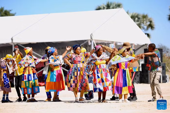 People perform during the 16th annual Omagongo Festival at Onamega Village, Omusati region, Namibia, May 23, 2026. Namibia on Saturday celebrated the 16th annual Omagongo Festival at Onamega village under the Uukwambi Traditional Authority in the country's northern Omusati Region, highlighting the enduring role of culture in fostering unity, identity and social cohesion. (Photo: Xinhua)