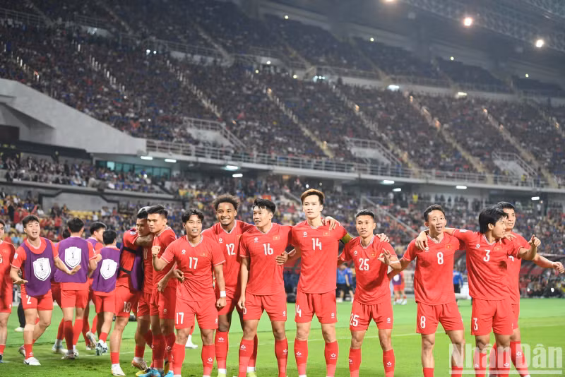 Members of the Vietnamese team celebrate the opening goal. Members of the Vietnamese team celebrate the opening goal.