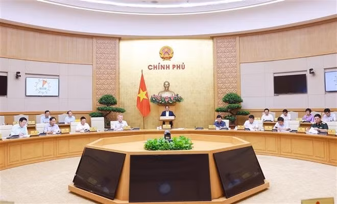 Prime Minister Pham Minh Chinh chairs the Government’s law-building session on May 22 (Photo: VNA)