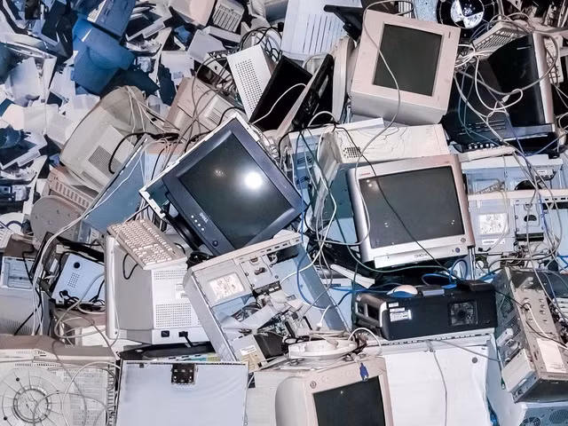 Old and broken household appliances and electrical equipment.