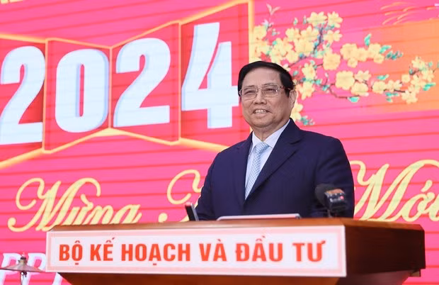 PM Pham Minh Chinh speaks at the meeting with representatives of donors and foreign-invested enterprises on January 26. (Photo: VNA)