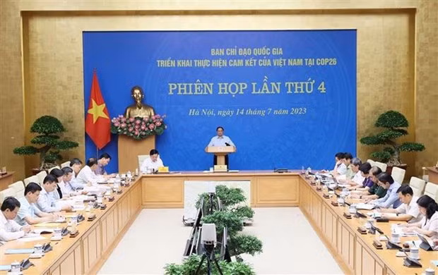 Prime Minister Pham Minh Chinh speaks at the meeting. (Photo: VNA)