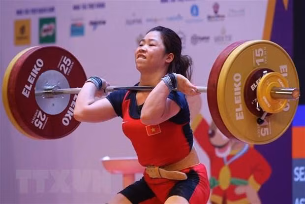 Hoang Thi Duyen seen competing at the 31st SEA Games in Hanoi last May. She will take part in the Asian championship in the women's 59kg. (Photo: VNA)