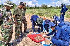 Members of Team K92 search for and recover fallen soldiers’ remains in Kep Province, Cambodia. (Photo: Phuong Vu)