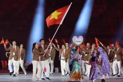 Members of the Vietnamese sports delegation parade at the opening ceremony of the 2026 Asian Games in Nagoya, Japan, on September 19, 2026. (Photo: Xinhua/VNA)