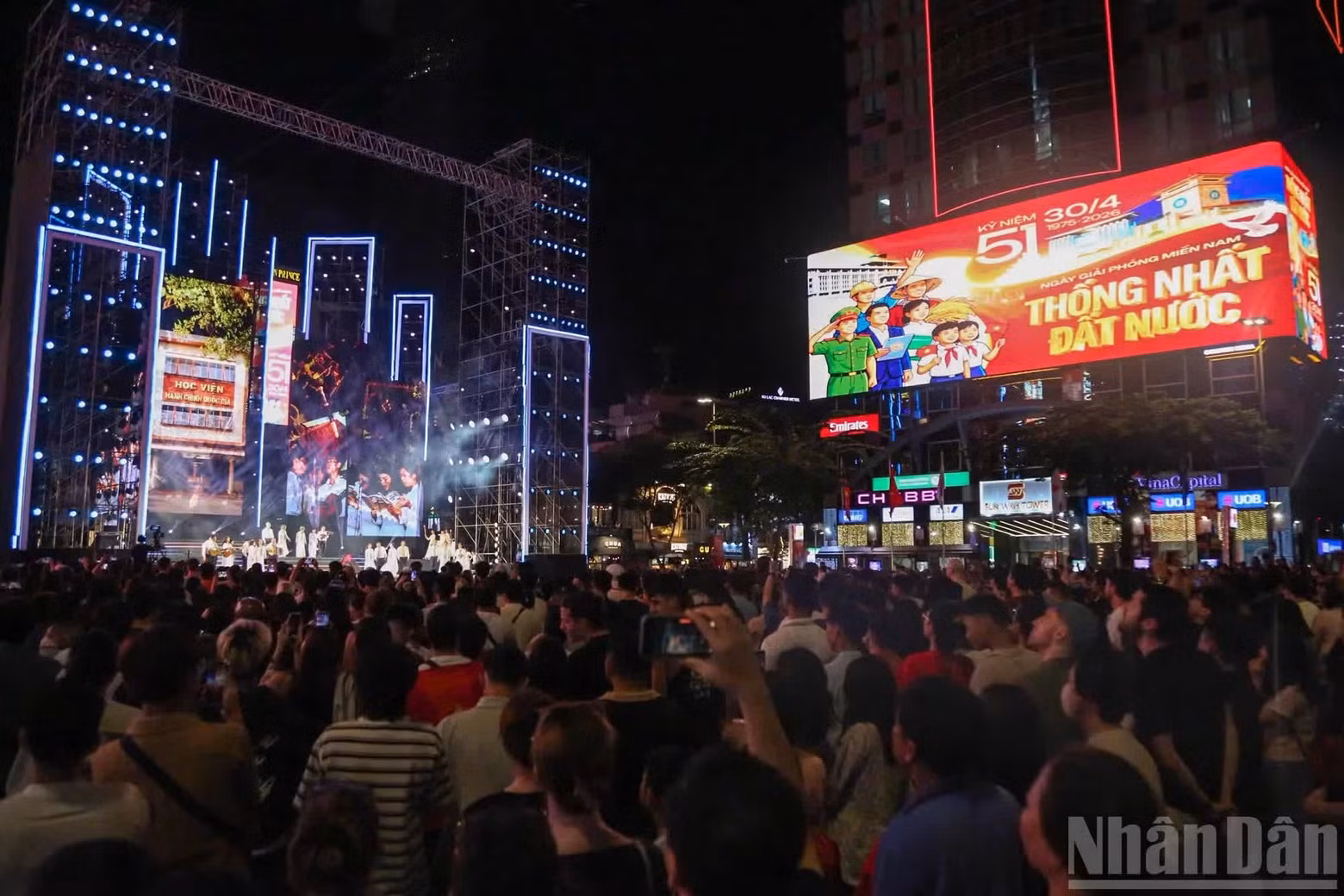 Large crowds gather at Nguyen Hue Pedestrian Street to enjoy a music programme entitled 'National Reunification'