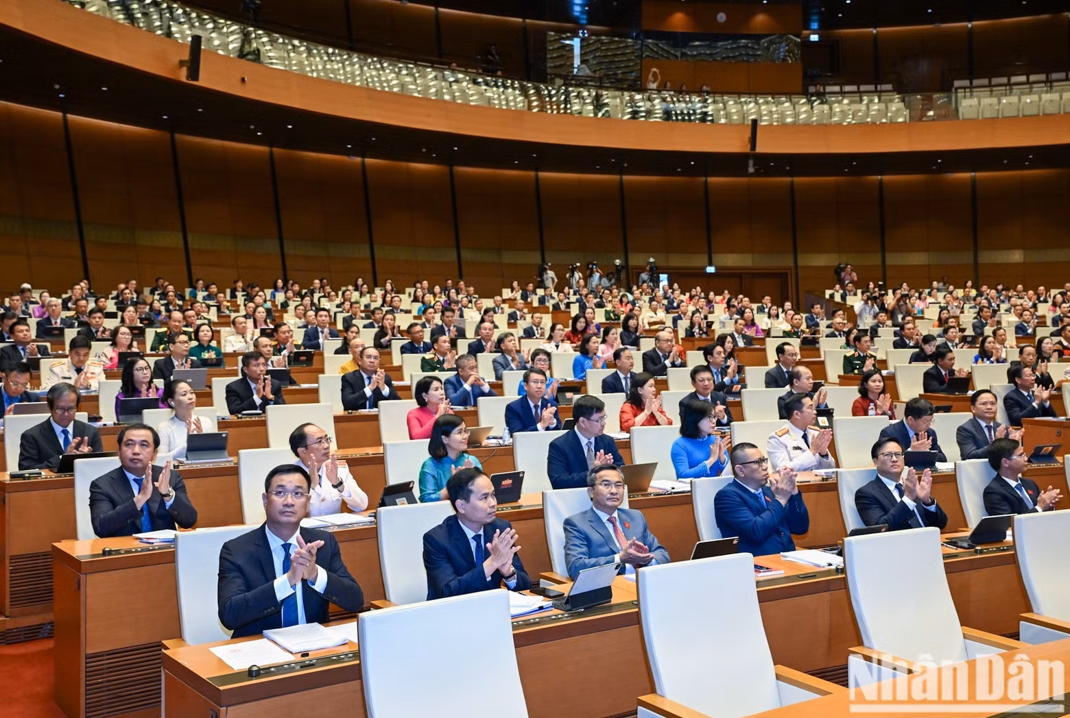 National Assembly deputies from provinces and centrally governed cities attend the opening session.