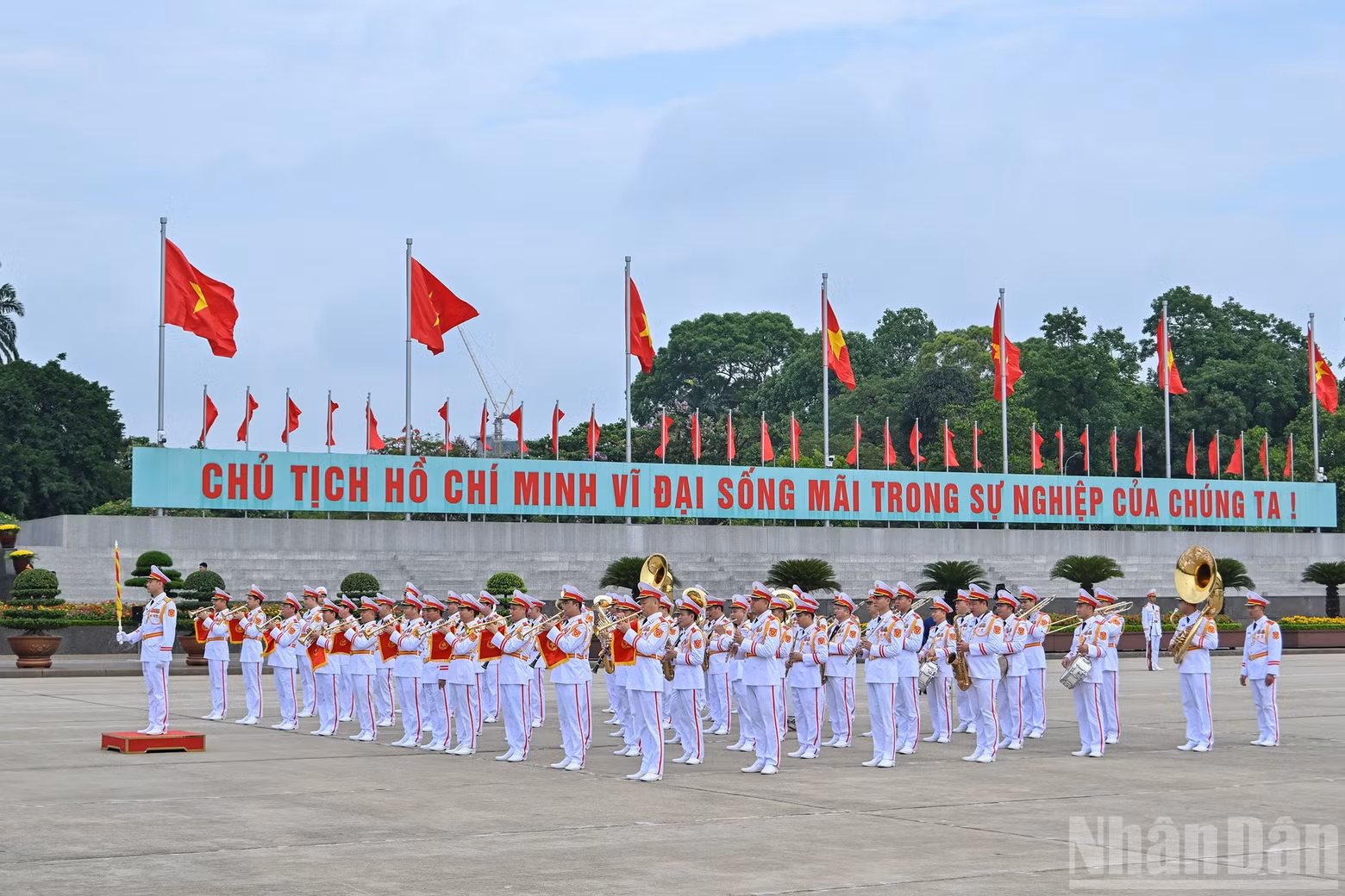 The military band performs ceremonial honours during the ceremony at Ba Dinh Square.