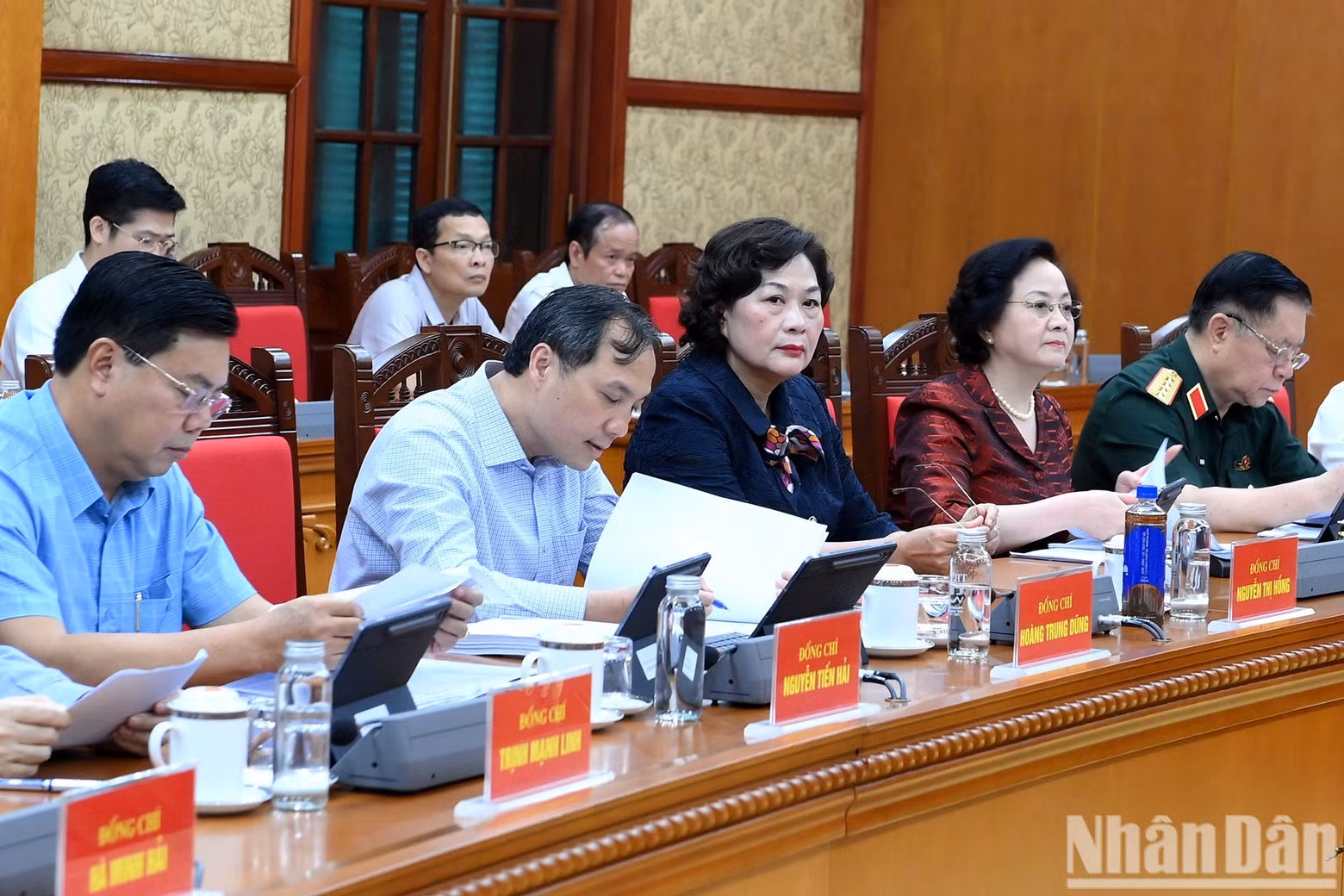Party and State leaders and delegates attend the working session.