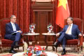 General Secretary of the Communist Party of Viet Nam Central Committee and President To Lam (right) and French Ambassador to Viet Nam Olivier Brochet at their meeting. (Photo: NDO)