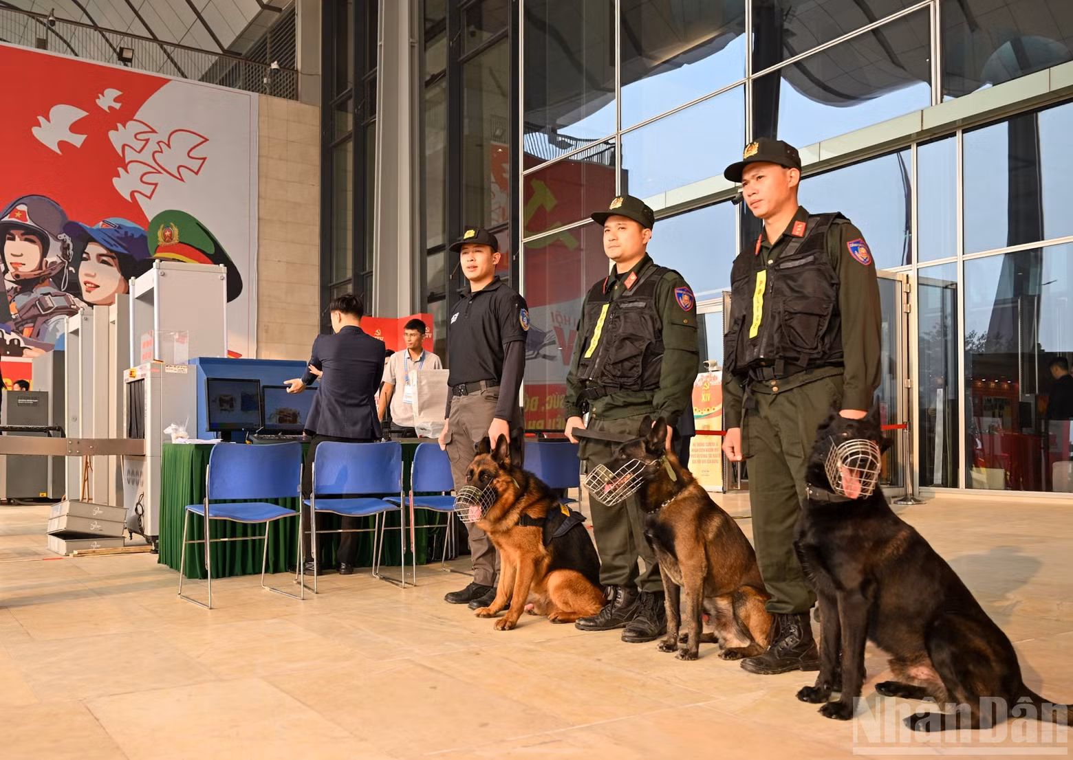 Officers and soldiers, together with sniffer dogs, on duty at the National Convention Centre.
