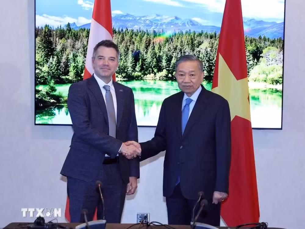 ttxvn-tong-bi-thu-chu-tich-nuoc-to-lam-tiep-mot-so-tap-doan-quy-dau-tu-lon-cua-canada-9050295-1jpg.jpg