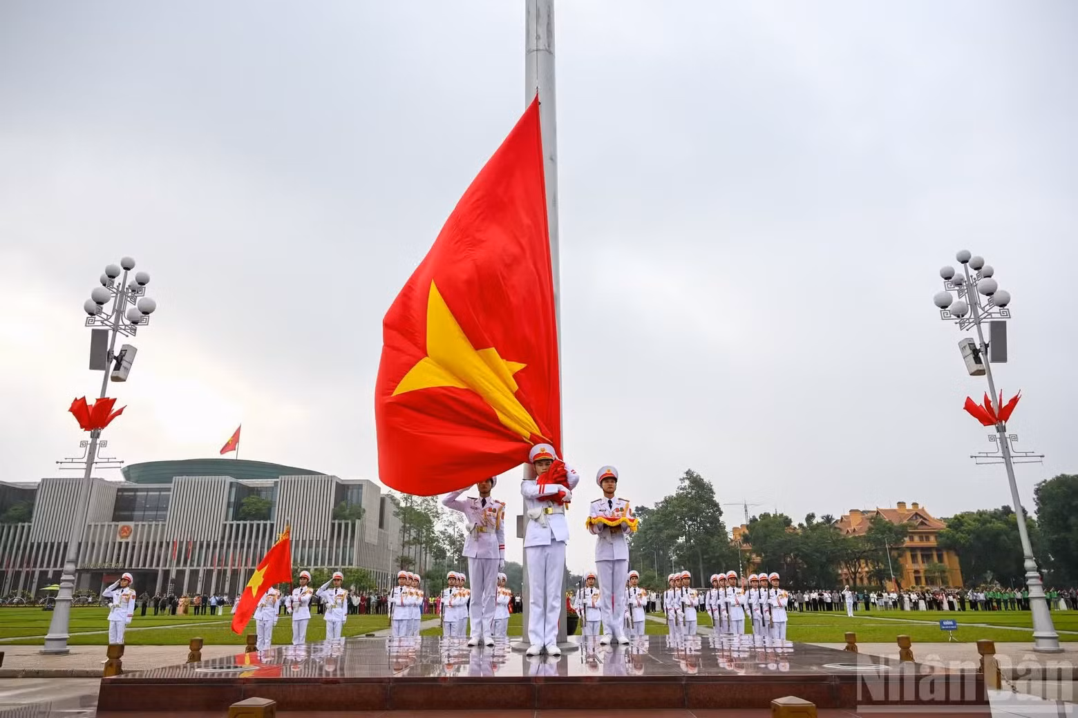 The national flag flies in the early morning sunlight.