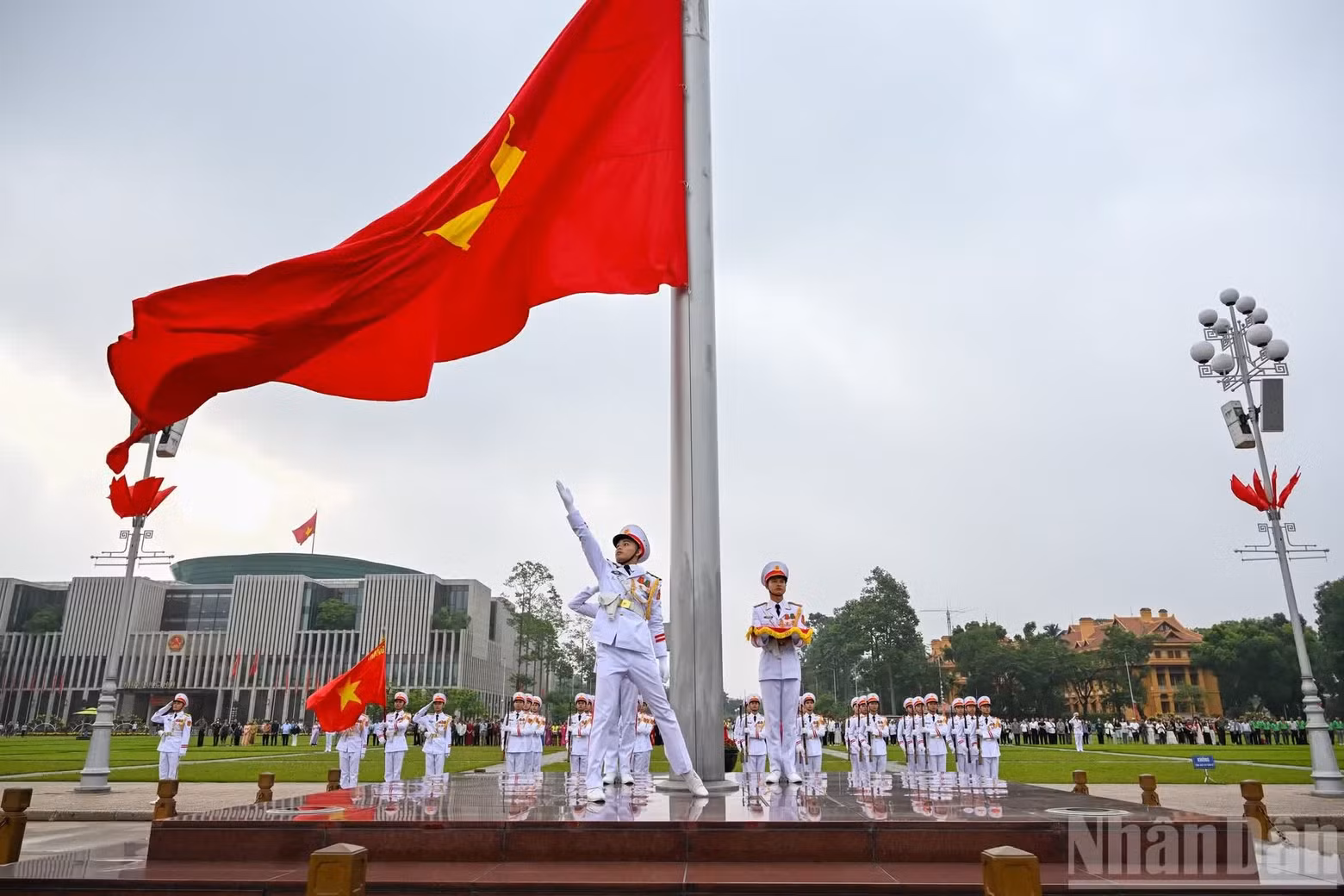 The national flag flies in the early morning sunlight.