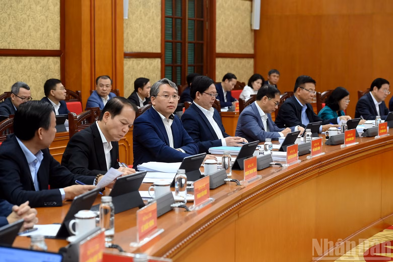 Delegates attend the meeting.