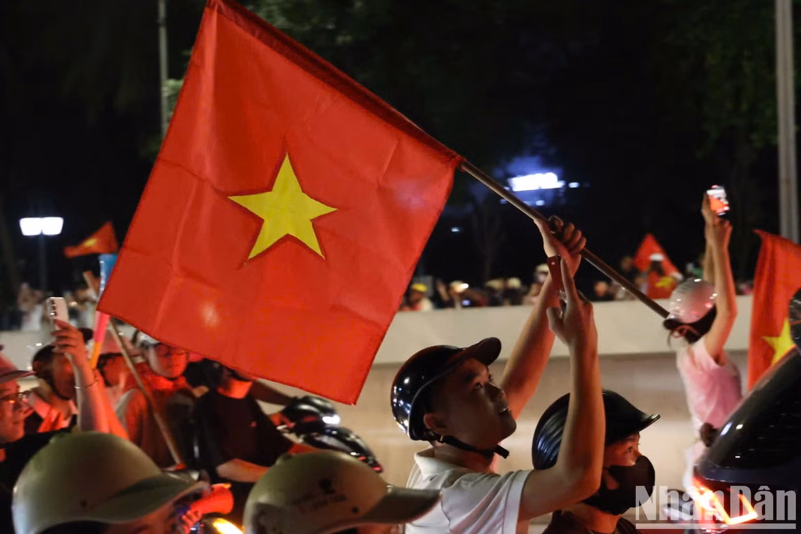 The national flag flies across the streets of Ha Noi. (Photo: The Dai)