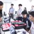 Students of Viet Nam National University (VNU) - Ha Noi, practise on equipment systems used for training and research in IoT and semiconductors. (Photo: VNU)