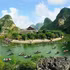Tourists visit the Trang An Landscape Complex, a UNESCO World Heritage Site. (Photo: NINH MANH THANG)